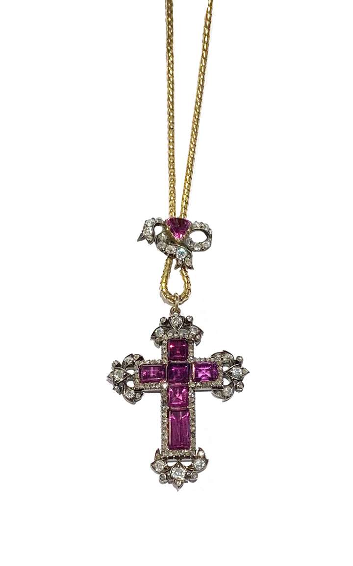 Garnet and diamond pendant on a chain necklace